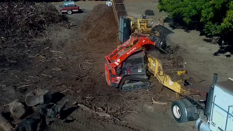 Tractor and implement working open ground